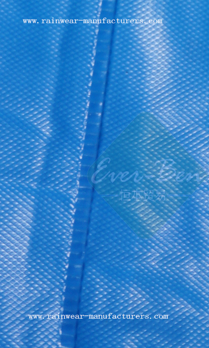 Blue vinyl rain poncho welding seams